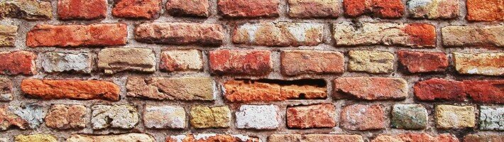 Как отделать кирпичную стену: внешняя и внутренняя отделка