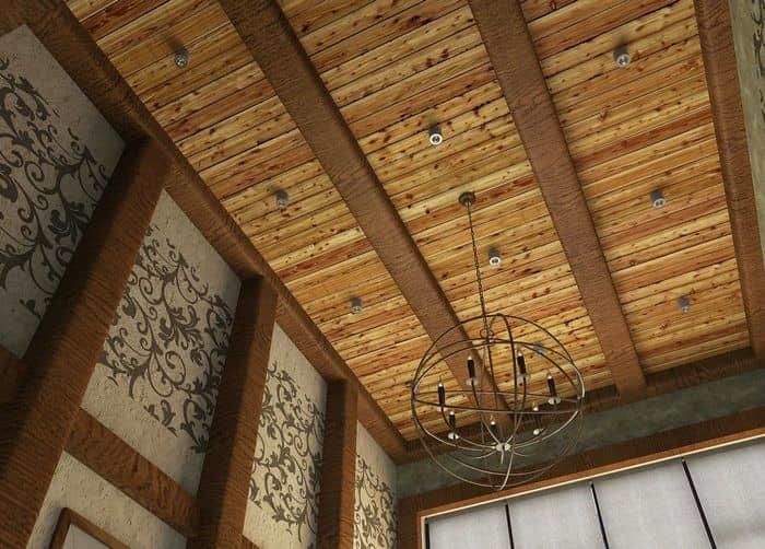 Стильно украсить потолок можно при помощи деревянных балок