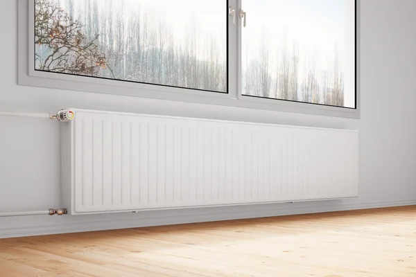 Центральное отопление attachted, чтобы обнести стеной закрывшие окна — стоковое фото