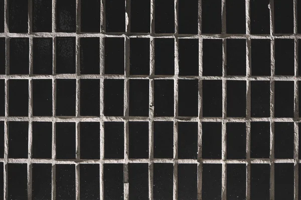 Черные плитки фона — стоковое фото